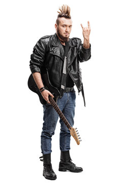 Punk rocker making a hardcore hand gesture