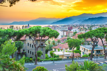 Amazing colorful sunset over the beautiful Italian city Bordighera.