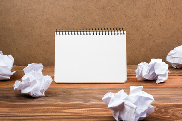 White blank paper notepad book at office worplace. Copy space