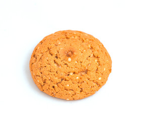 Macro oatmeal cookie isolated on white.