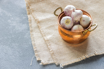 Garlic in a vintage small saucepan