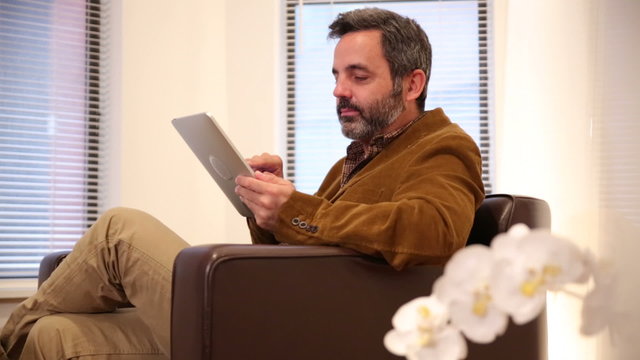 Man using tablet in office