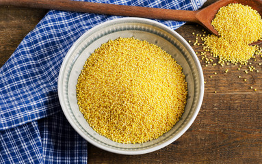 Raw Millet in bowl.