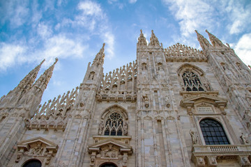 Fototapeta na wymiar Facade upward closup view of the Milan cathedral, Italy