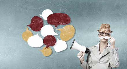 Businesswoman trying paper mustache