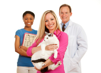 Veterinarian: Woman Holds Cat with Vet Behind