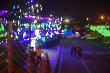 Fototapeta na wymiar Blur image of modern light at the theme park with bokeh effect.