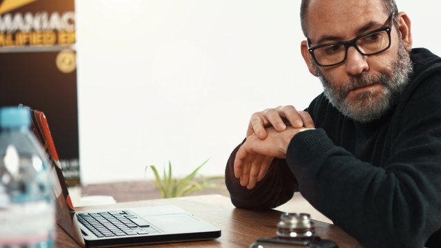 Waiting Businessman in small business office