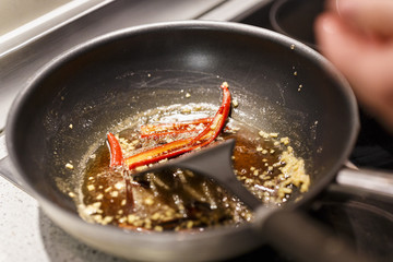pan on the stove boiling ingredients