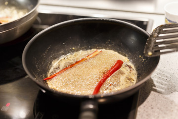 pan on the stove boiling ingredients