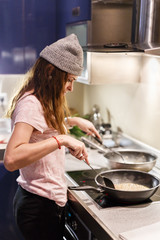 woman cooking in the kitchen