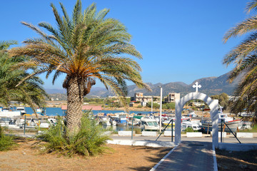 Summer landscape with port of Malia.