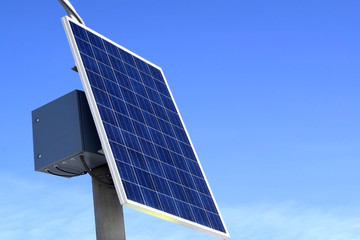 Solar panels on bright blue sky background. Renewable Energy. Horizontal shot