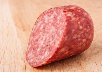 Smoked sausage on a cutting board close-up