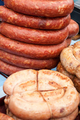 Raw fresh pork sausages for grilling