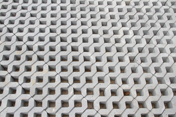 Pattern of cement block on the floor as square hole,