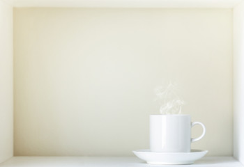 Fototapeta na wymiar Cup of coffee, smoke, and scenes.