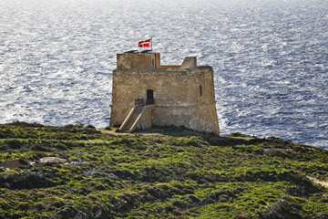 Fototapeta na wymiar Dwejra tower on Gozo island. Dwejra Bay. Malta