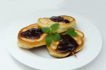Pancakes with jam and mint