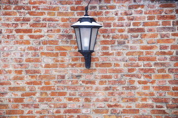 photo of a street lamp on a brick wall background