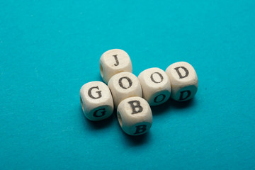 GOOD JOB text on a wooden cubes