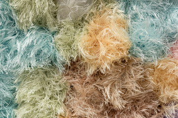 fluffy pastel yarn ball background