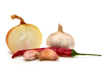 Garlic and chili pepper, onion on a white background