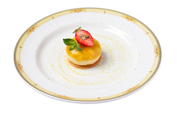 mango mousse with strawberry cream on strawberry biscuit