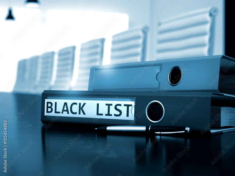 Poster file folder with inscription black list on desktop. black list - business concept on blurred backgro
