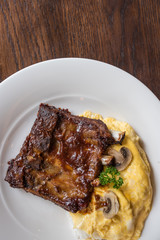 Barbecue pork ribs on wooden table, Top view