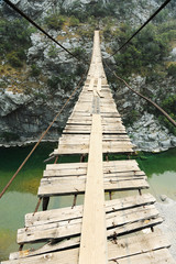 Suspension bridge in the canyon