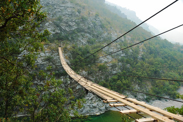 Suspension bridge in the canyon