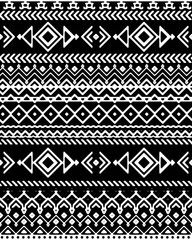 Seamless hand drawn chevron pattern with ethnic and tribal ornament. Vector black and white fashion illustration