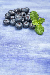 Fresh blueberries and mint leaf