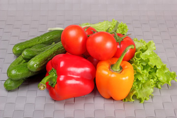 Cucumbers, tomatoes, paprika and lettuce leaves