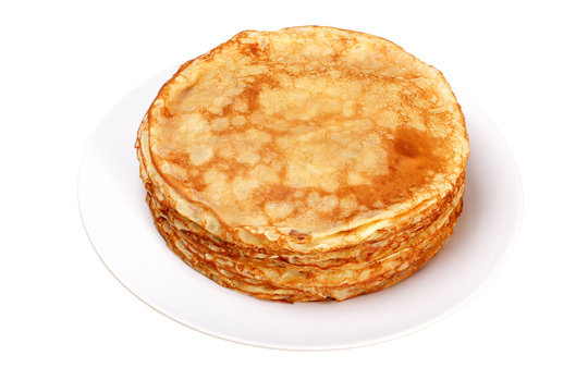 Stack of pancakes on white plate