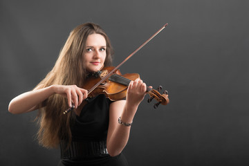 portrait of a beautiful violinist
