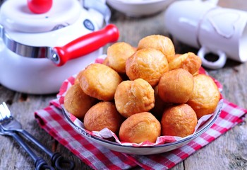 Homemade donuts on wooden background. Rustic style. 
