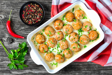 Swedish homemade meatballs smothered in a creamy gravy sauce, cl