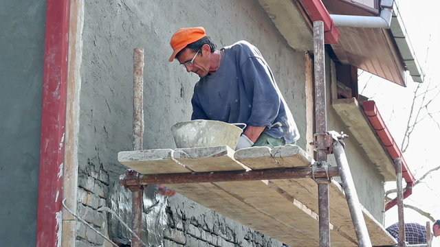 Applying Cement Render to a Brick Wall