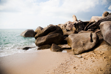 Fototapeta na wymiar large rocks washed by the ocean 