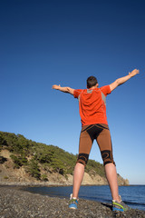 Fototapeta premium Running man in the summer in a beautiful location.