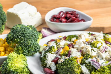 Broccoli salad with vegetables and feta cheese.