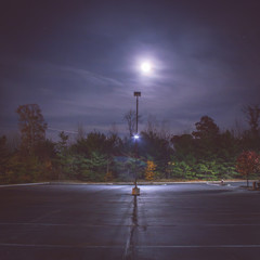 Parking lot at night under the moonlight © jeffcampbell