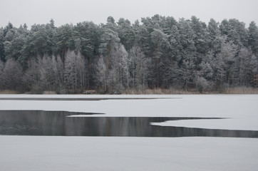 Frozen Dlugie lake, Olsztyn, Warmia region, Poland.