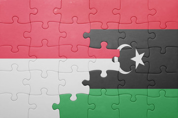 puzzle with the national flag of indonesia and libya