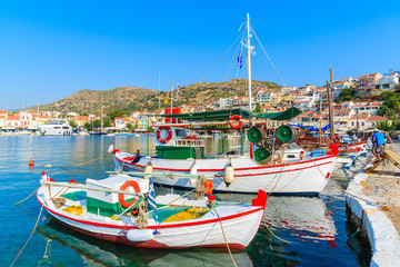 Typical colorful Greek fishing boats in Pythagorion port on Samos island, Greece