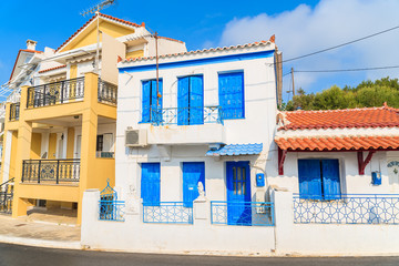 Typical Greek style houses on street of Pythagorion town, Samos island, Greece