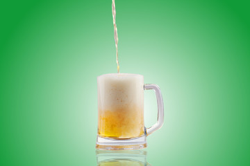 Beer pouring into glass.