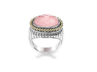 Rose quartz silver and gold ring isolated on white